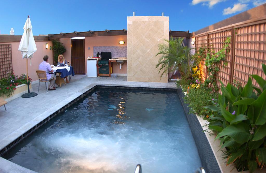 Fortina Spa Resort スリーマ エクステリア 写真 A rooftop pool in Marrakech, Morocco